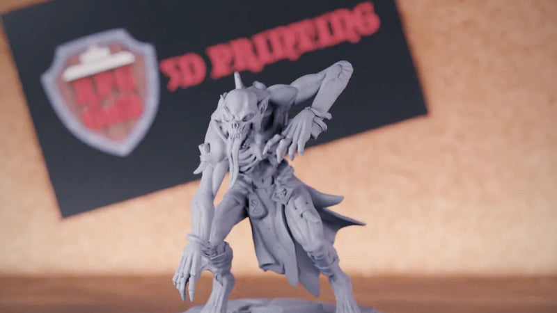 Ghoul 5e miniature with skeletal face and clawed hands raised, standing on a rubble-strewn base