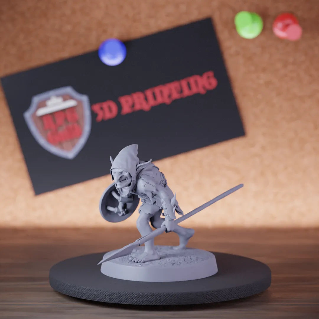Highly detailed goblin soldier spear shield miniature of Goblin, perfect for DnD 5e encounters, fantasy tabletop RPG campaigns, painting and display.